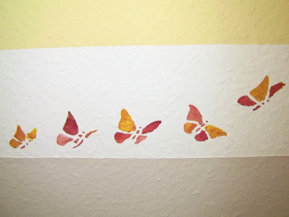 Schmetterlinge mit Schablone aufgetragen
